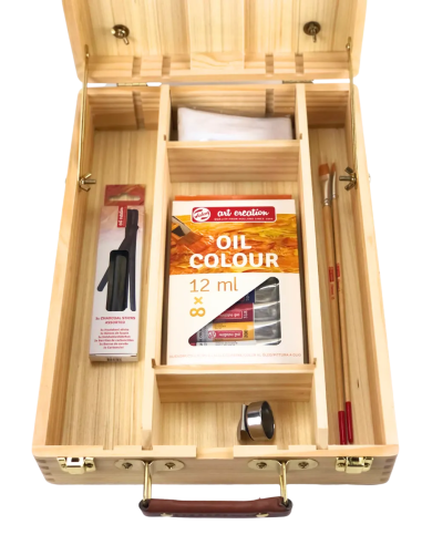 Interior de la caja Artemisa con 8 óleos de 12 ml, dos pinceles, carboncillos, paño y pocillo metálico